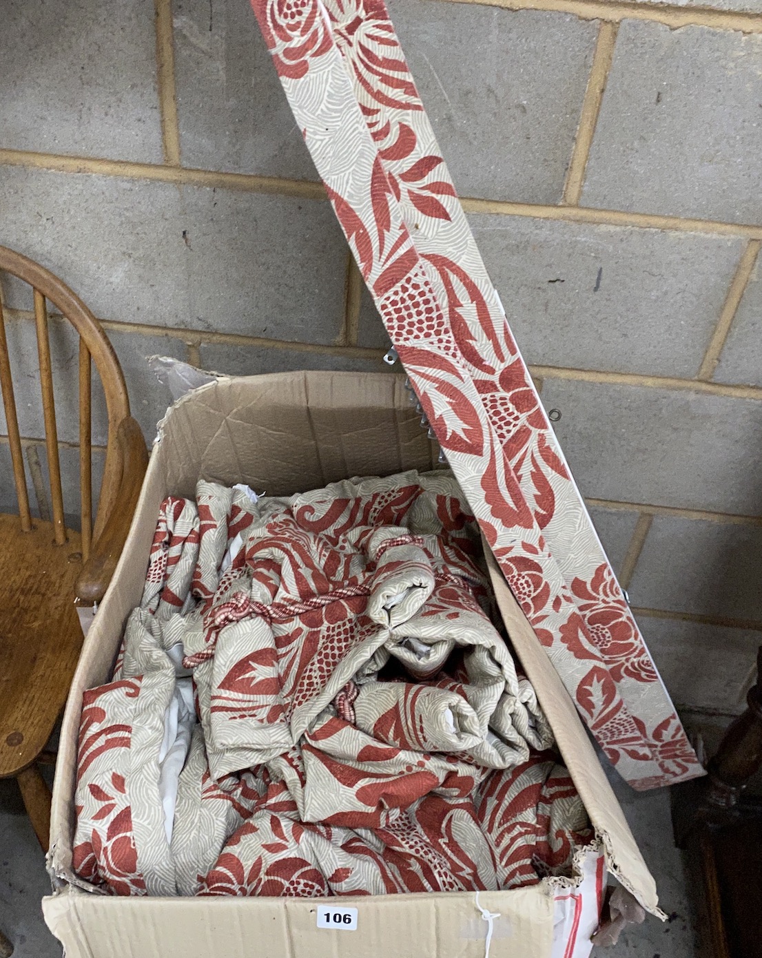 Two pairs of red patterned floral curtain's each 260cm x 180cm, and two curved pelmets.